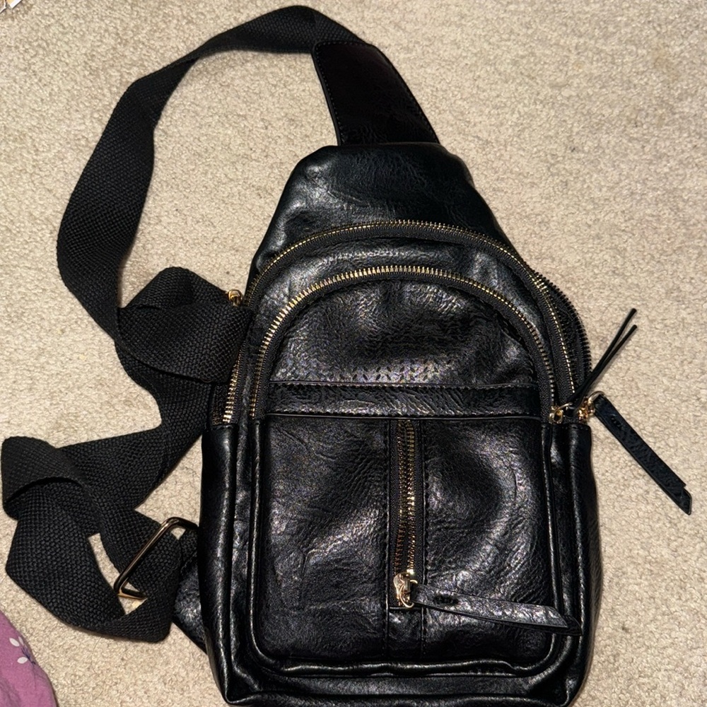 Black leather sling bag